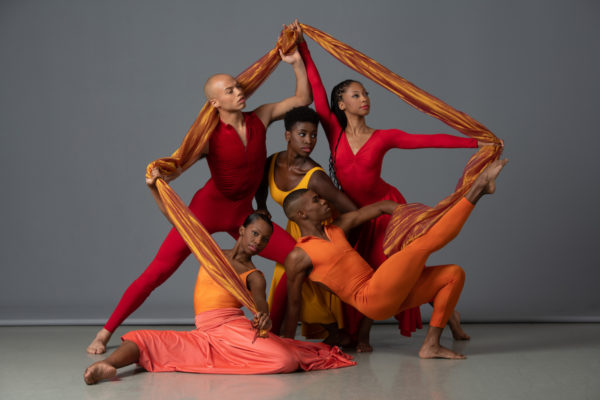 A group of contemporary dancers in different positions