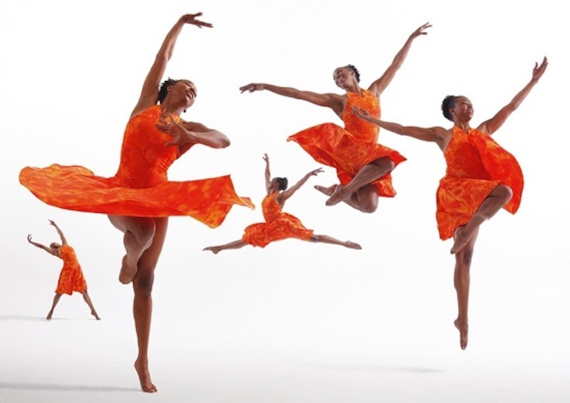 five women in red jump