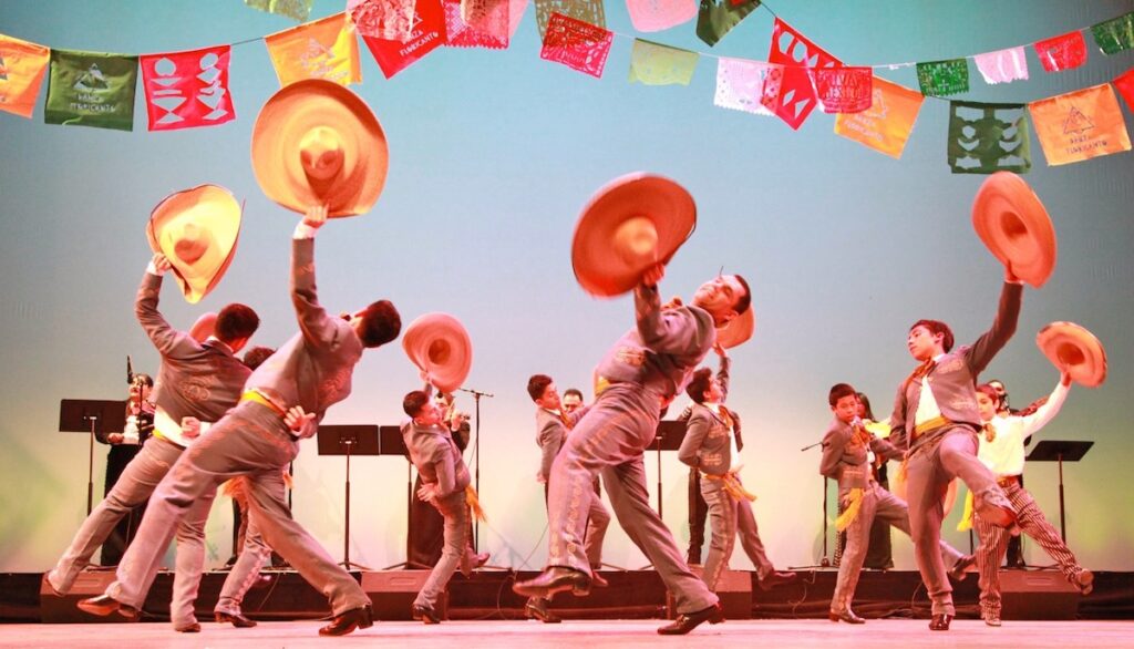A group of dancers with sombreros