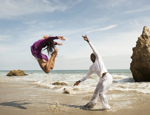 Two dancers as the beach