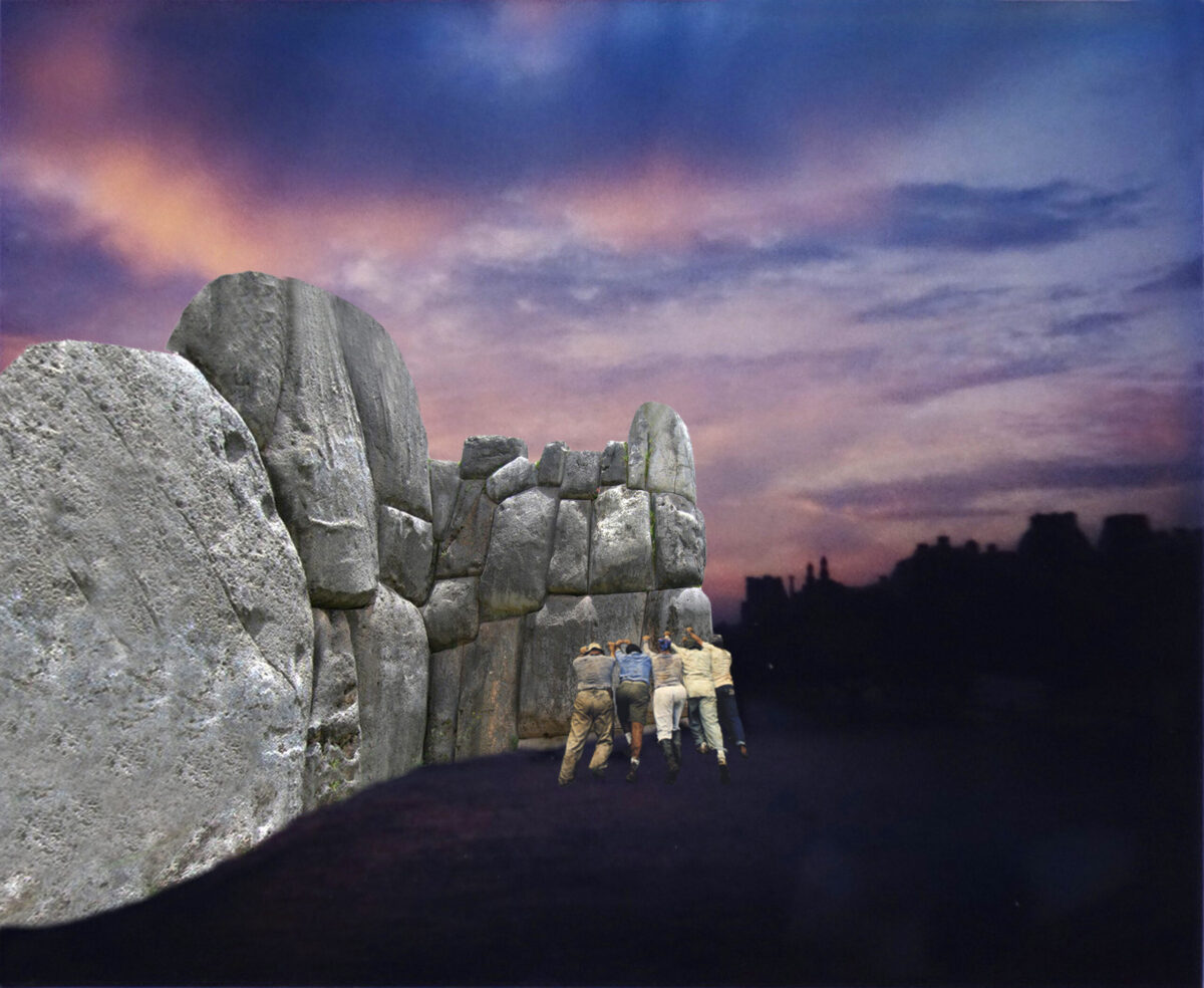 Five people hold up walls made up of boulders and large rocks, the blue and pink sky ominous above them.