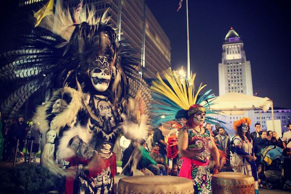 dancers in Aztec costumes