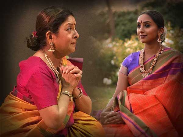 Two women in Indian sari dresses