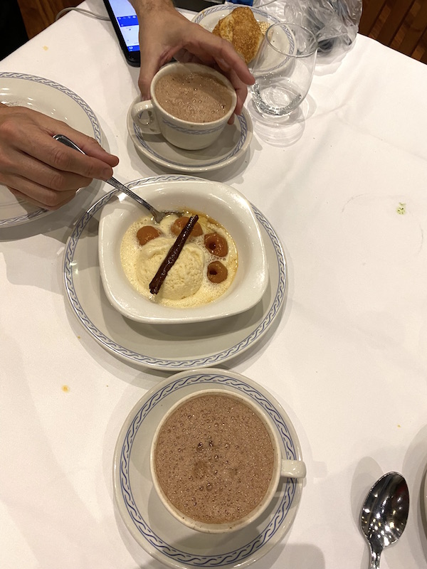 Dessert: vanilla ice cream laid with a cinnamon stick, and wreathed with tejocotes.