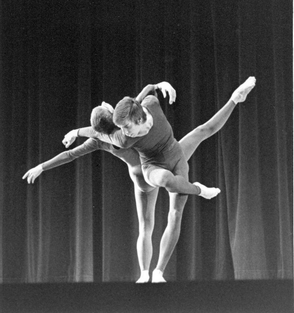A male and female dancer tangled