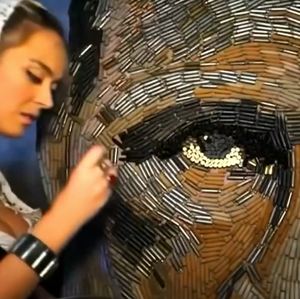 Photo of Daria Marchenko with her artwork