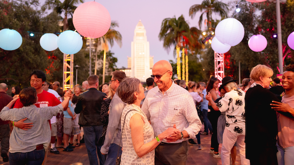 A couple dances at the Music Center