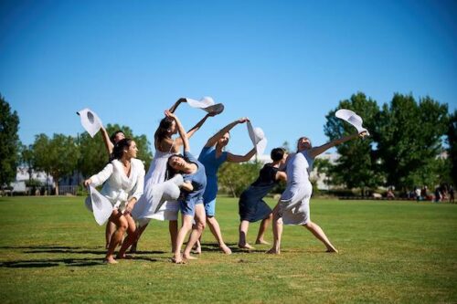 Dancers in a green space