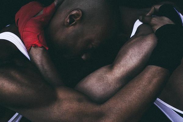 Two figures embrace