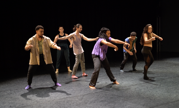 A group of dancers in casual clothes