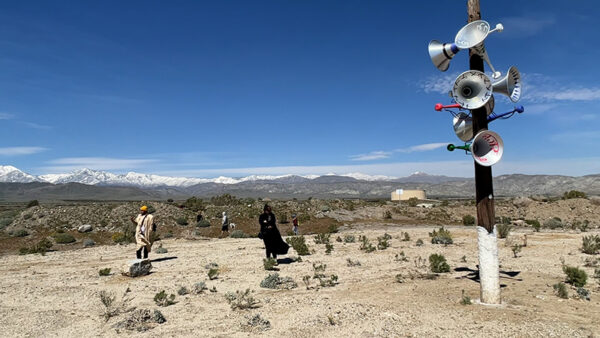 Speakers on a post in the desert