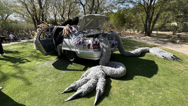 View of an old car with soft sculptures