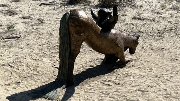 Sculpture of birth on a horse