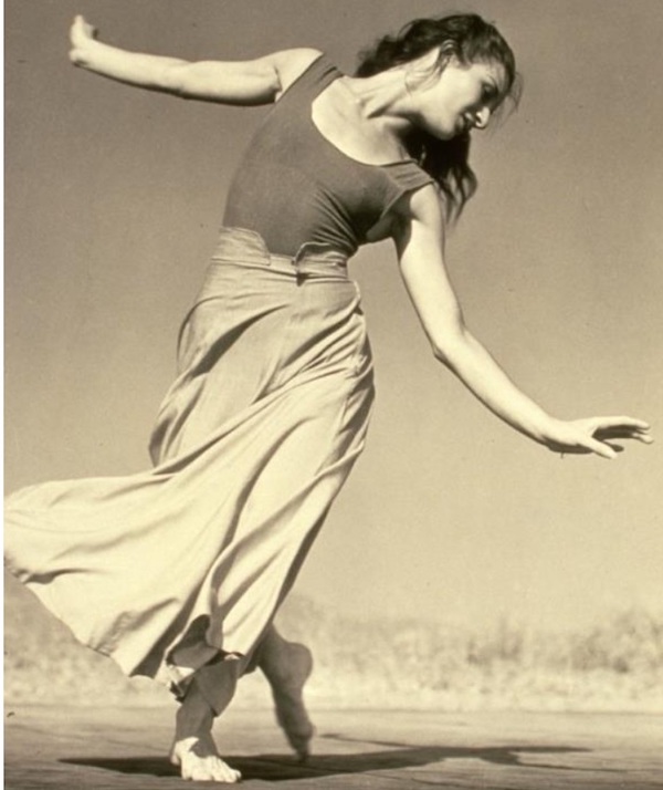 A dancer looks at the ground