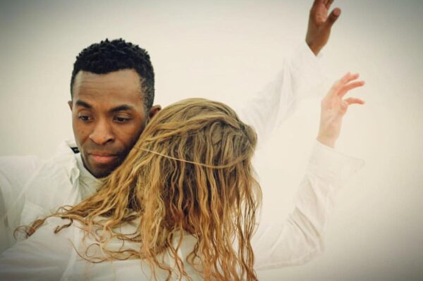 Two people in white