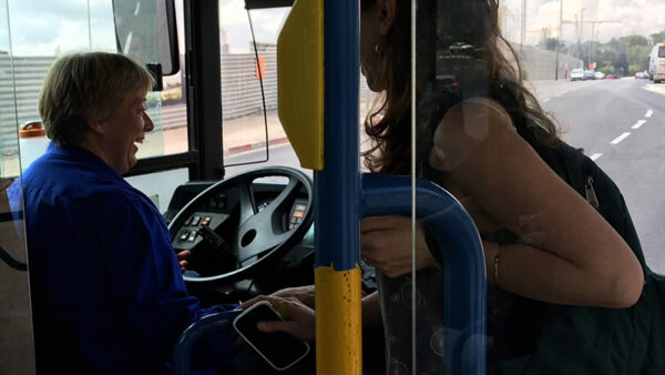 A woman bus conductor