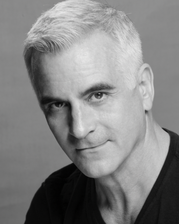 Portrait of man with white hair