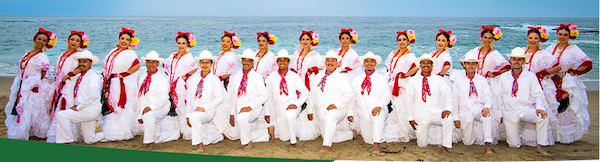 A line of dancers in white