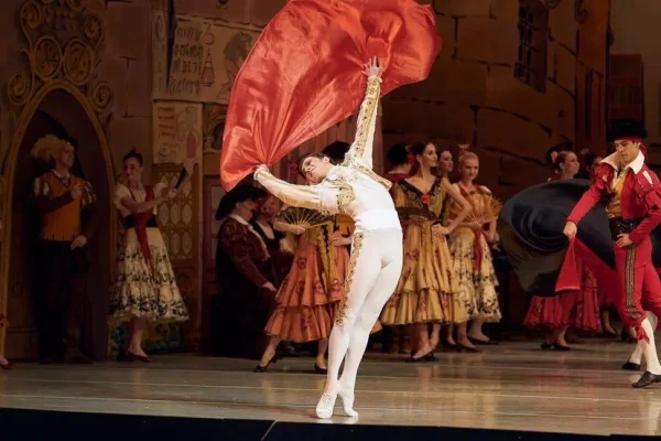 A dancer strikes a bullfighter pose
