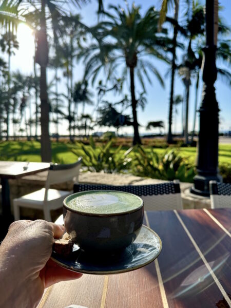 A cup of matcha tea on Convivo patio