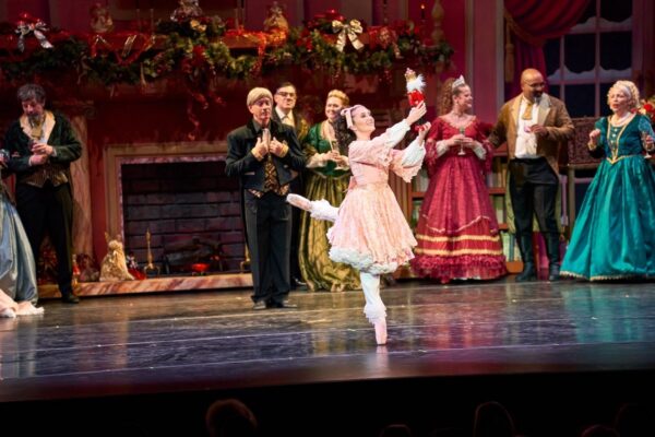 A girl dances with a Nutcracker
