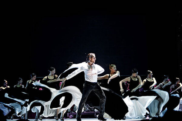 Flamenco dancers fill the stage