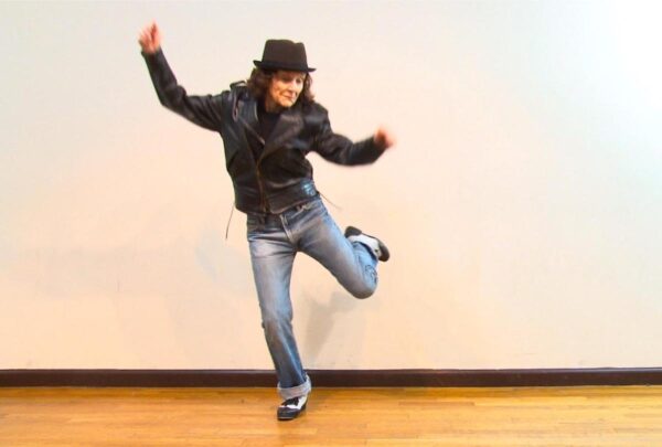 A tap dancer in a hat