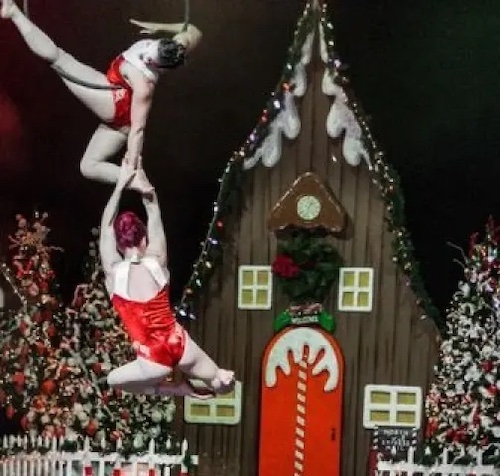 Two acrobats in red