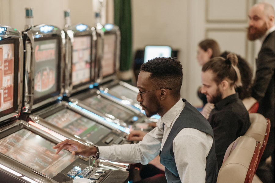 man at slot machine