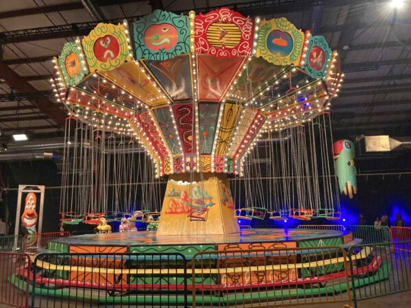 Swing ride by Kenny Scharf