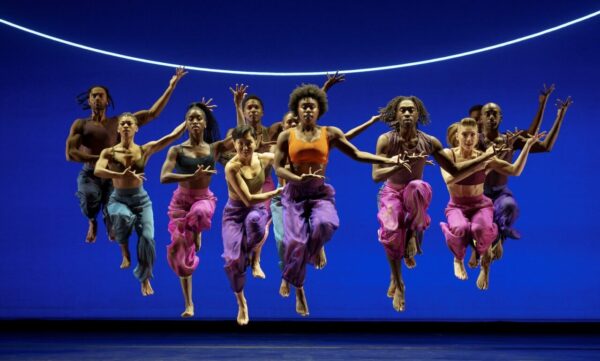A group of dancers jump