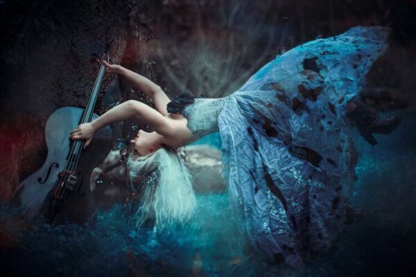 A woman on her back in blue dress