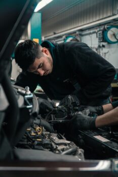 mechanic working on car