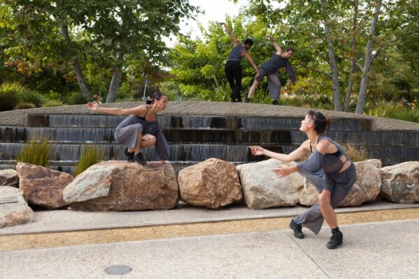 Dancers arouind a pond