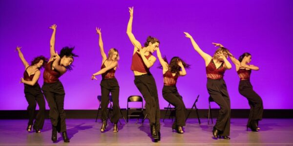 A group of dancers strike a pose