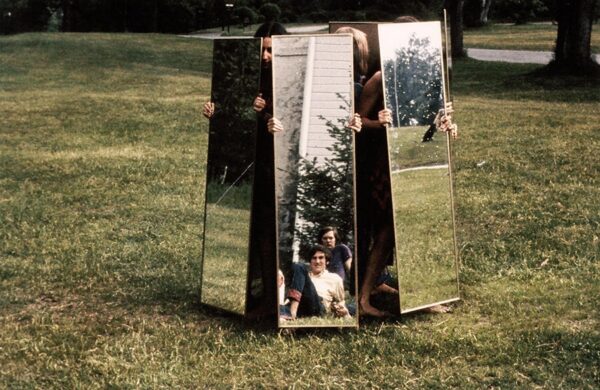 dancers holding mirrors in Mirror Piece