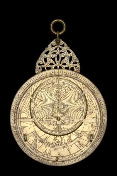 Muhammad b. Abi Bakr (Iranian, active 1200s), Astrolabe With a Geared Calendar, front view, 1221 or 1222, copper alloy, silvered copper alloy, silver, and wax; History of Science Museum, University of Oxford, images © History of Science Museum, University of Oxford.