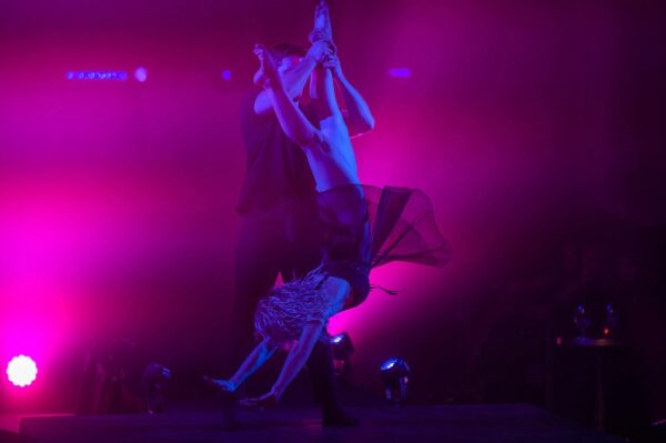 A male dancer holds his partner