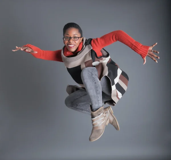 A woman leaps in the air