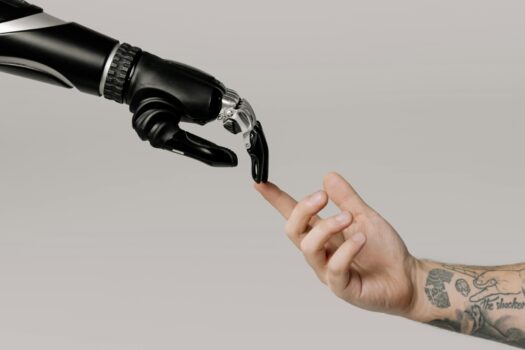 Robot finger touching human finger