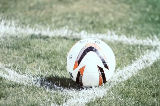 colorful soccer ball on field.