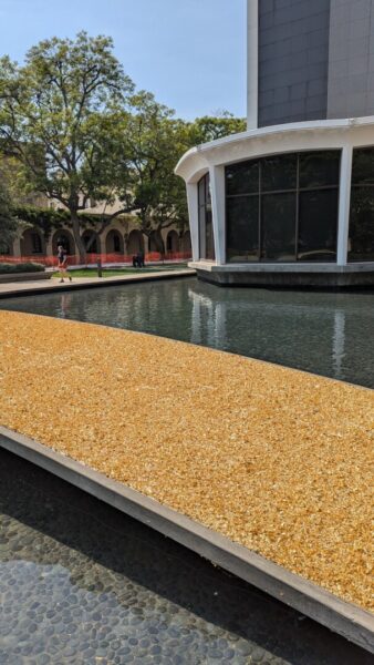 Lita Albuquerque, This Moment in Time, 2024, artificial gold leaf on vinyl and concrete; courtesy of the artist. Photograph by Stephen West.