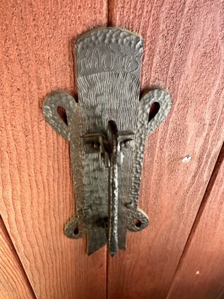 Original hardware on Twin Pine cabin's front door.