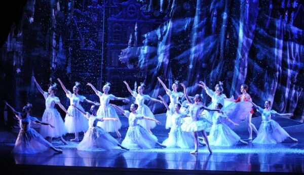 Dancers in white costumes