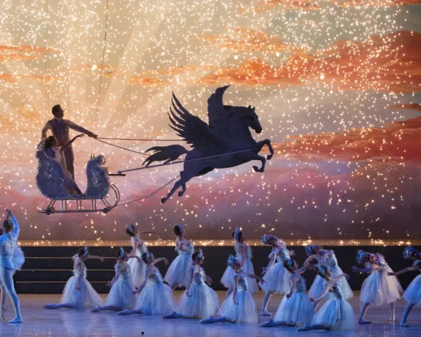A flying horse above ballet dancers