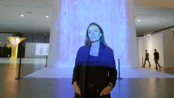 A light-made waterfall with the artist