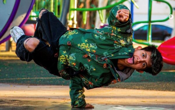 A dancer in one-arm stand