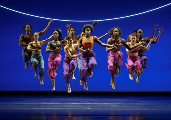 A group of dancers jump