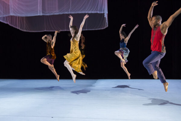 Dancer jump wit a filmy fabric