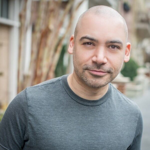 A man with a grey shirt in portrait